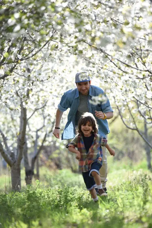 Father chasing after his son