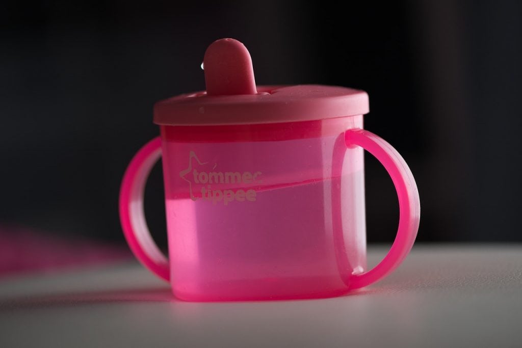Pink sippy cup for toddlers and babies