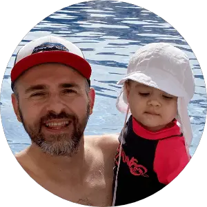 Father and daughter in the water
