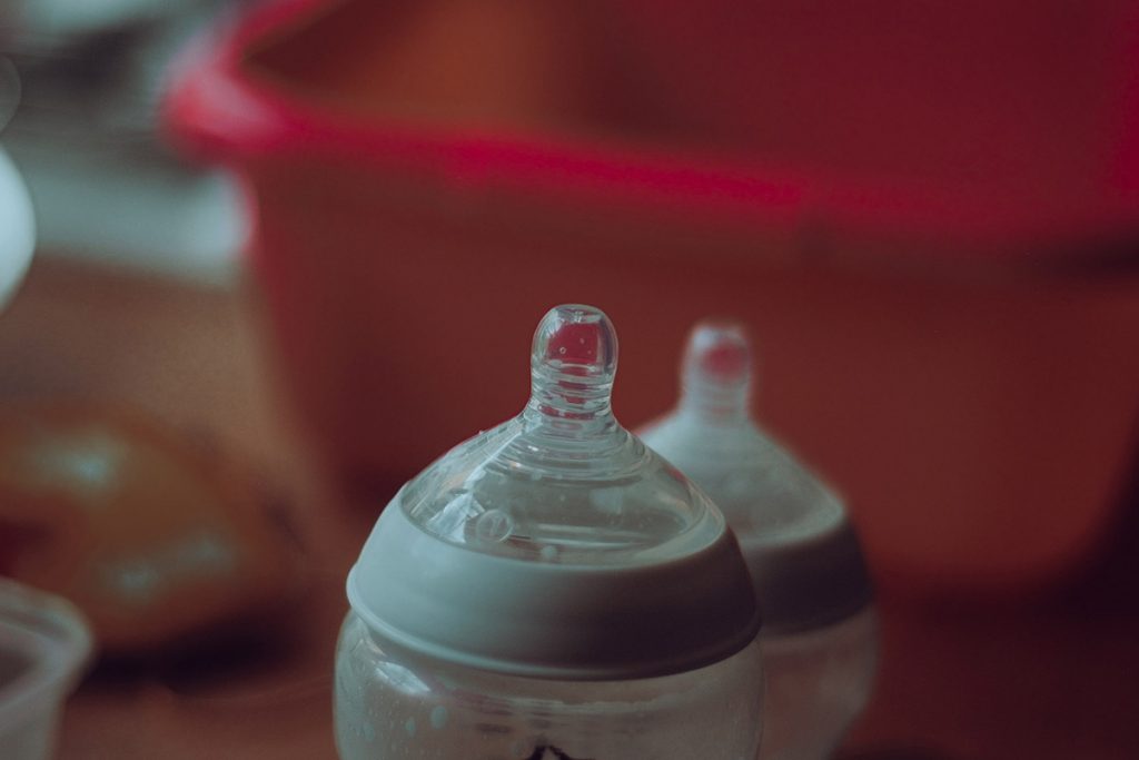 Clear plastic feeding bottle