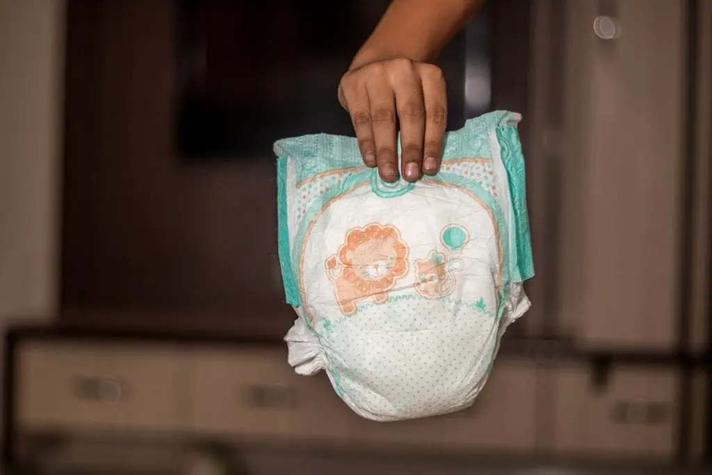Person holding a diaper