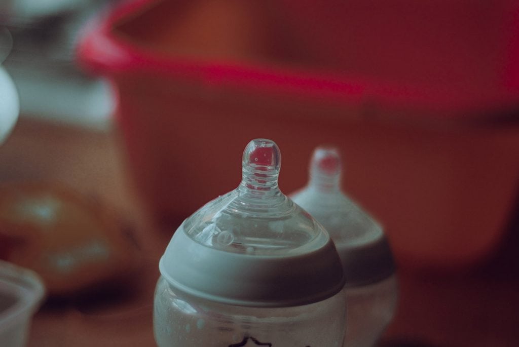 feeding bottle on the red table