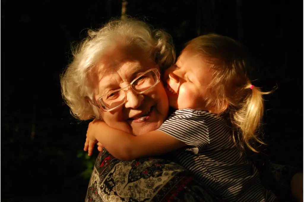 grandma hugging a girl
