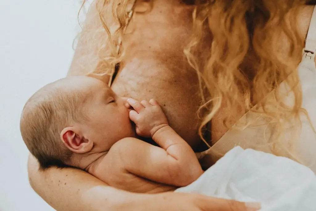 women breastfeed her baby